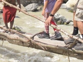 feet on beam bridge papua